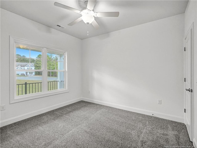 114 Kingwood Dr, Lillington, NC 27546 - carpeted empty room with baseboards, a ceiling fan, and visible vents