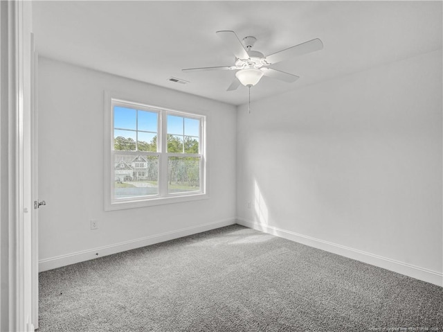 114 Kingwood Dr, Lillington, NC 27546 - carpeted empty room with baseboards, a ceiling fan, and visible vents