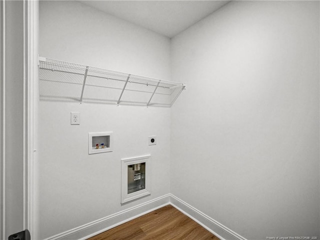114 Kingwood Dr, Lillington, NC 27546 - laundry room featuring hookup for an electric dryer, baseboards, washer hookup, laundry area, and dark wood finished floors