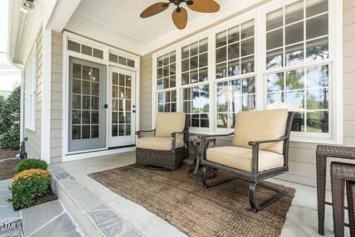 view of patio with french doors and a ceiling fan