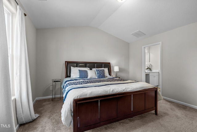 2040 Alderman Way, Creedmoor, NC 27522 - bedroom featuring carpet floors, vaulted ceiling, baseboards, and connected bathroom