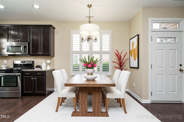 7229 Terregles Dr, Raleigh, NC 27617 - dining area with a chandelier, recessed lighting, dark wood finished floors, and baseboards