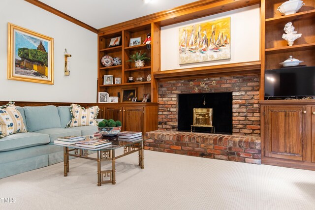 living room with ornamental molding, built in features, carpet, and a brick fireplace