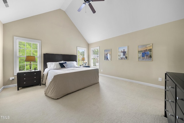 bedroom featuring light colored carpet, baseboards, visible vents, and high vaulted ceiling