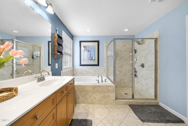 full bathroom with a bath, vanity, tile patterned flooring, and a shower stall