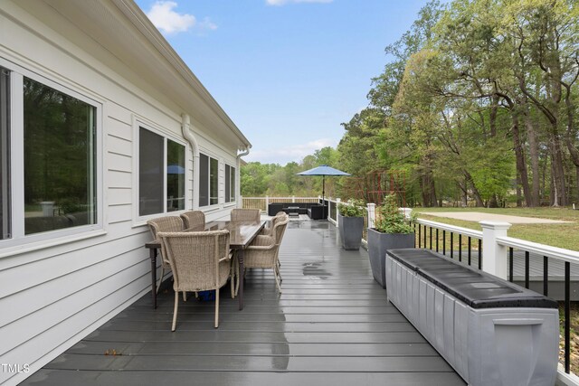 6024 Lunenburg Dr, Raleigh, NC 27603 - wooden terrace with outdoor lounge area and outdoor dining area