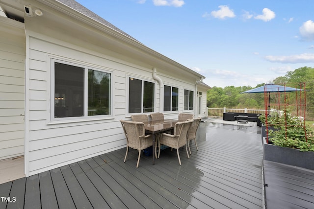 6024 Lunenburg Dr, Raleigh, NC 27603 - wooden deck featuring an outdoor hangout area and outdoor dining space