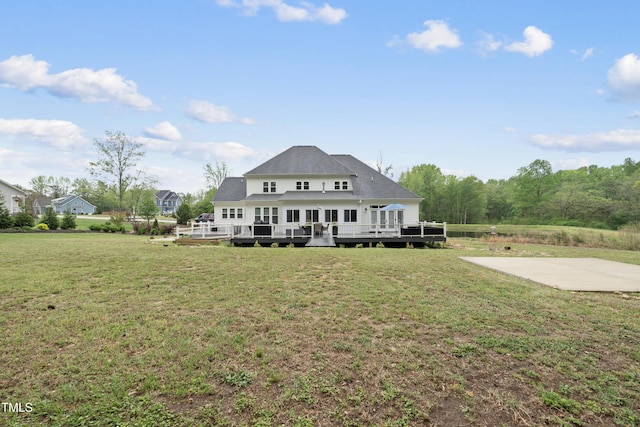 6024 Lunenburg Dr, Raleigh, NC 27603 - rear view of house featuring a wooden deck, a shingled roof, and a yard