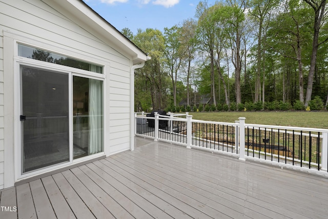 6024 Lunenburg Dr, Raleigh, NC 27603 - wooden terrace featuring a lawn