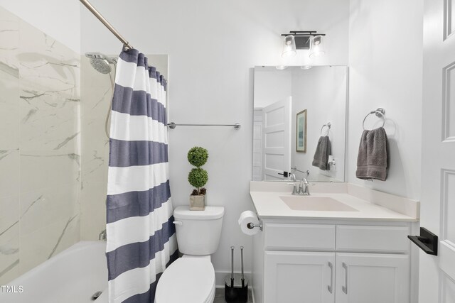 6024 Lunenburg Dr, Raleigh, NC 27603 - full bathroom with toilet, vanity, and shower / bath combination with curtain