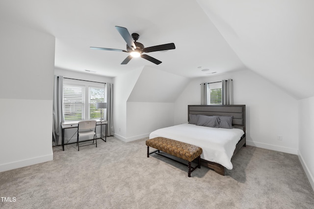 6024 Lunenburg Dr, Raleigh, NC 27603 - bedroom with vaulted ceiling, carpet flooring, and multiple windows