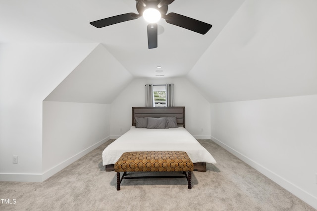 6024 Lunenburg Dr, Raleigh, NC 27603 - carpeted bedroom featuring ceiling fan, vaulted ceiling, and baseboards