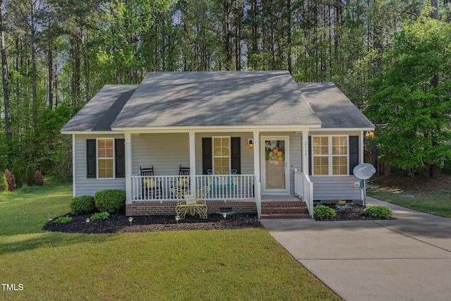 2112 Ballston Pl, Knightdale, NC 27545 - single story home featuring a front lawn and covered porch