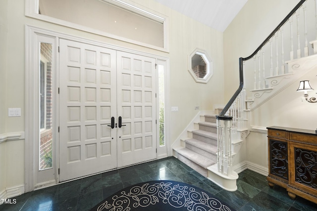 6212 Trevor Ct, Raleigh, NC 27613 - foyer featuring baseboards and stairway