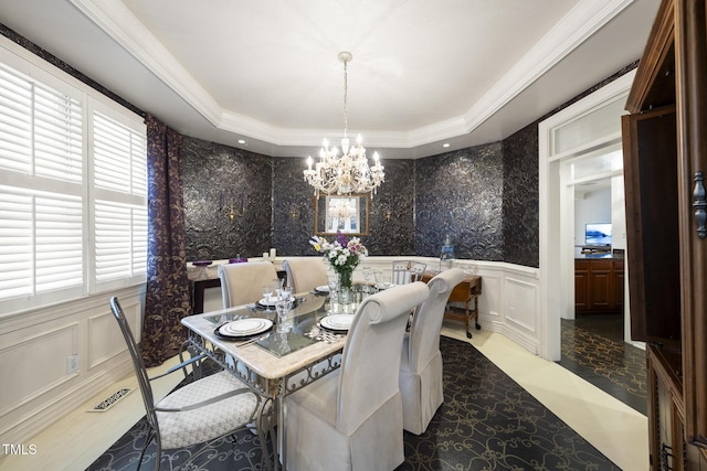 6212 Trevor Ct, Raleigh, NC 27613 - dining room with a decorative wall, an inviting chandelier, ornamental molding, and plenty of natural light