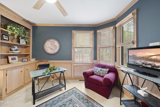 6212 Trevor Ct, Raleigh, NC 27613 - home office featuring a decorative wall, a ceiling fan, ornamental molding, visible vents, and wainscoting