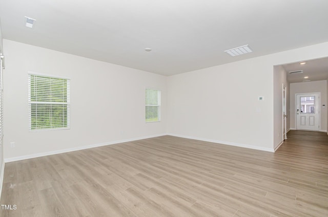 680 Winesap Dr, Graham, NC 27253 - unfurnished room with light wood-style floors and baseboards