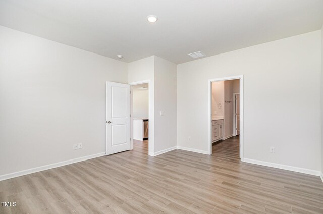 680 Winesap Dr, Graham, NC 27253 - unfurnished bedroom with baseboards, light wood finished floors, ensuite bathroom, and recessed lighting