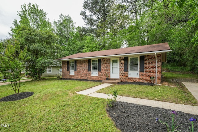508 Solar Dr, Raleigh, NC 27610 - single story home featuring brick siding and a front yard
