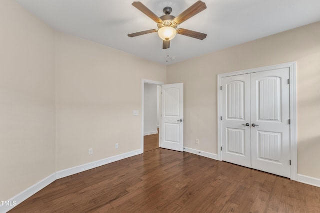 644 Angelica Cir, Cary, NC 27518 - unfurnished bedroom with wood finished floors and baseboards