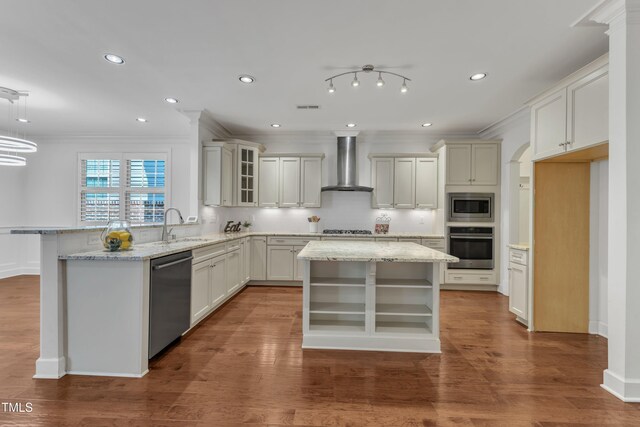 644 Angelica Cir, Cary, NC 27518 - kitchen with wall chimney range hood, appliances with stainless steel finishes, ornamental molding, a peninsula, and a sink
