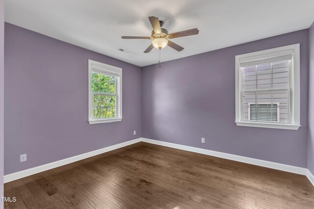 644 Angelica Cir, Cary, NC 27518 - empty room featuring baseboards, ceiling fan, and wood finished floors