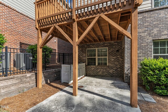 644 Angelica Cir, Cary, NC 27518 - view of patio with central AC unit and fence