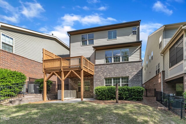 644 Angelica Cir, Cary, NC 27518 - back of property featuring brick siding and a deck