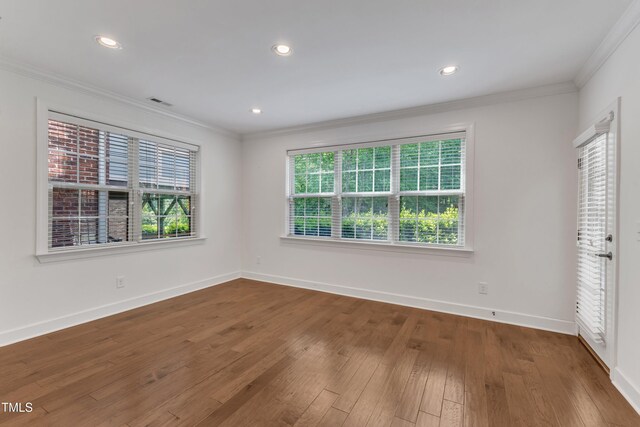 644 Angelica Cir, Cary, NC 27518 - unfurnished bedroom with ornamental molding, hardwood / wood-style floors, baseboards, and recessed lighting