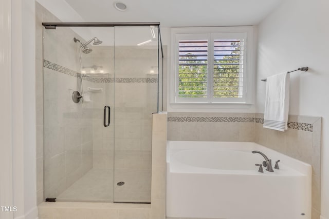 644 Angelica Cir, Cary, NC 27518 - bathroom with a bath and a shower stall