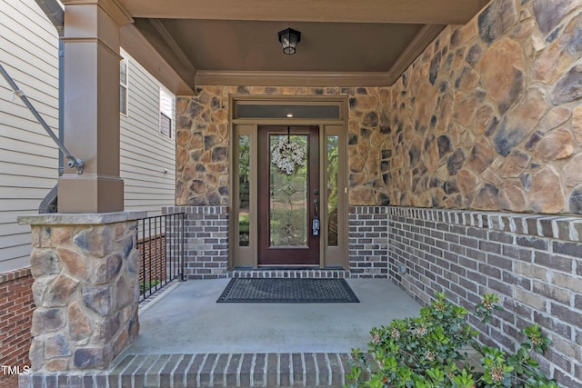 644 Angelica Cir, Cary, NC 27518 - view of exterior entry featuring stone siding and a porch