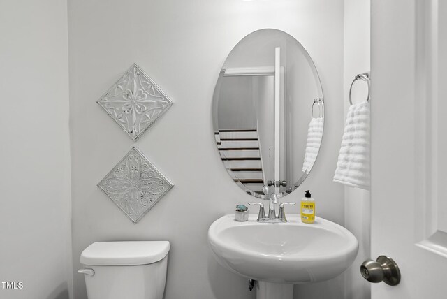 6511 Academic Ave, Raleigh, NC 27616 - half bathroom featuring a sink and toilet