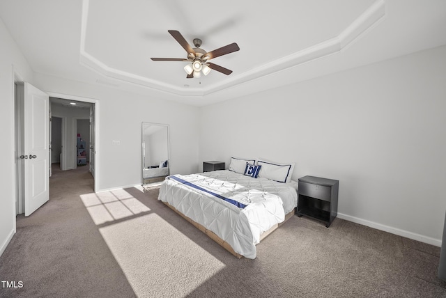 6511 Academic Ave, Raleigh, NC 27616 - bedroom featuring baseboards, carpet floors, a ceiling fan, and a raised ceiling