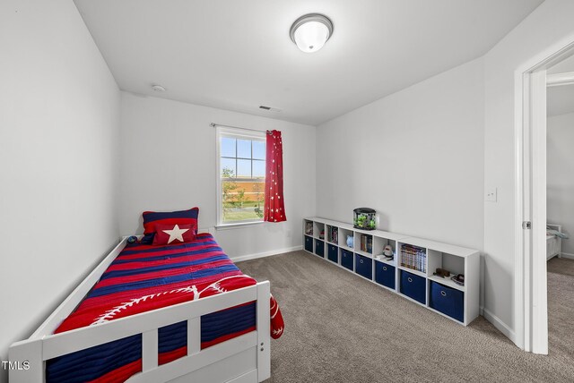 6511 Academic Ave, Raleigh, NC 27616 - carpeted bedroom featuring visible vents and baseboards