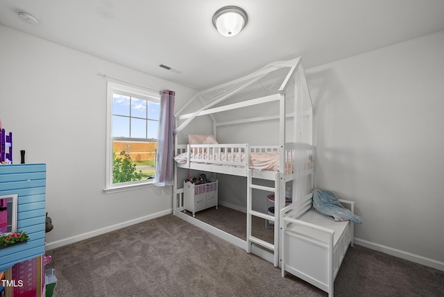 6511 Academic Ave, Raleigh, NC 27616 - bedroom featuring baseboards, visible vents, and carpet