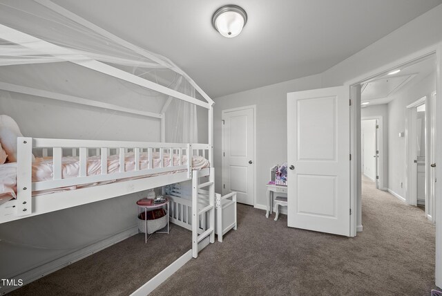 6511 Academic Ave, Raleigh, NC 27616 - bedroom with attic access, vaulted ceiling, and carpet flooring