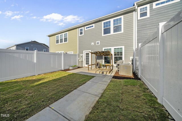 6511 Academic Ave, Raleigh, NC 27616 - back of property with a pergola, a yard, a fenced backyard, and a patio