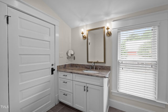 109 N Hassel St, Hillsborough, NC 27278 - bathroom with vanity, lofted ceiling, and tile patterned floors