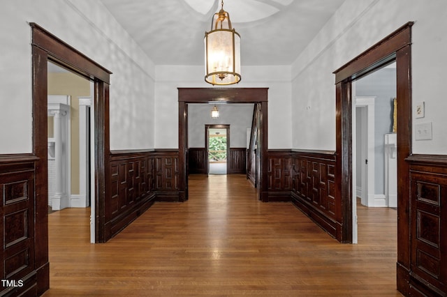 109 N Hassel St, Hillsborough, NC 27278 - hall with wood finished floors and a wainscoted wall