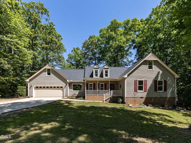 view of front facade featuring a front lawn, covered porch, crawl space, concrete driveway, and an attached garage