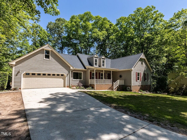 view of front of home with covered porch, crawl space, a garage, a front lawn, and concrete driveway