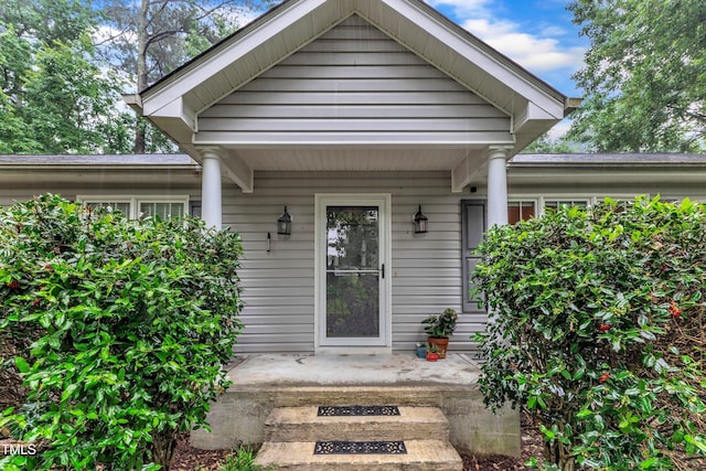 1311 Theodore Ln, Durham, NC 27703 - doorway to property with covered porch