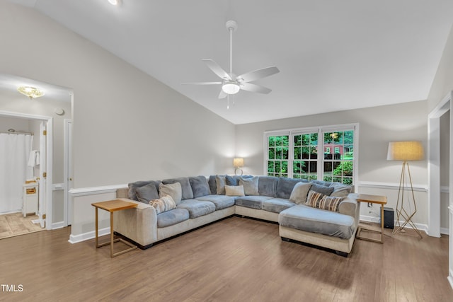 1311 Theodore Ln, Durham, NC 27703 - living area with lofted ceiling, ceiling fan, wood finished floors, and baseboards