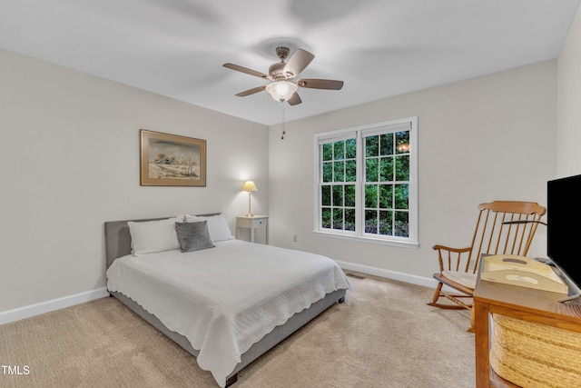 1311 Theodore Ln, Durham, NC 27703 - bedroom with baseboards, light colored carpet, and a ceiling fan