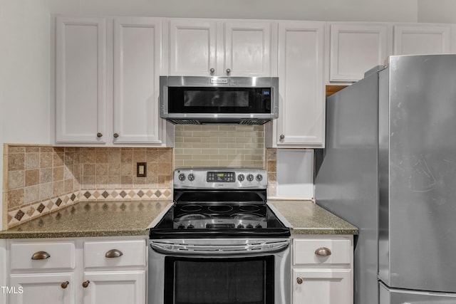 1311 Theodore Ln, Durham, NC 27703 - kitchen with stainless steel appliances, white cabinets, decorative backsplash, and stone countertops
