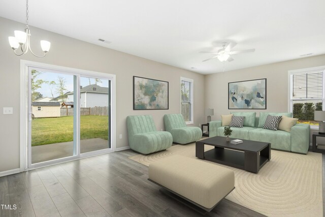 36 Slate Ln, Rocky Point, NC 28457 - living room with plenty of natural light, a chandelier, wood finished floors, and ceiling fan