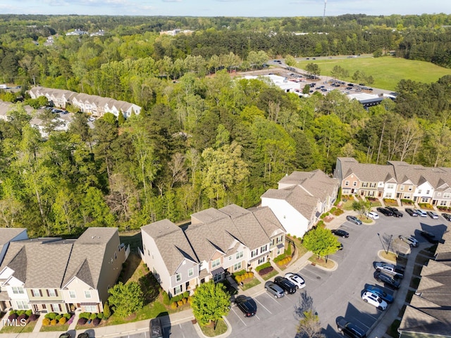 6230 Pesta Ct, Raleigh, NC 27612 - aerial perspective of suburban area featuring a heavily wooded area
