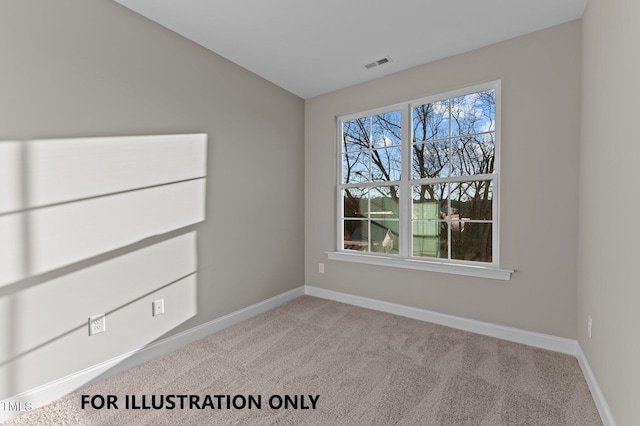 spare room featuring baseboards, visible vents, and carpet floors