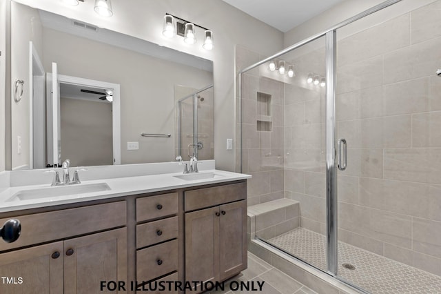 full bathroom with double vanity, visible vents, a sink, and a stall shower