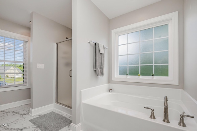 45 Leighann Ct S, Timberlake, NC 27583 - bathroom featuring marble finish floors, a stall shower, a garden tub, and baseboards